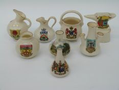 A collection of crested china to include Grafton china cow with Dorchester crest,