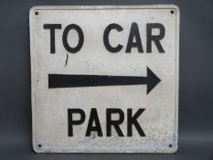 A vintage cast aluminium 'to car park' road sign cast with name Gowshall Ltd, B'ham & London,