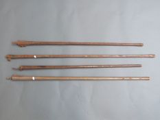 Four various muzzle loading gun barrels,