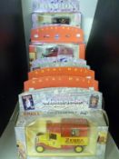 Twelve Corgi Motoring Memories diecast model vans including London Scene, Colman's Mustard etc,