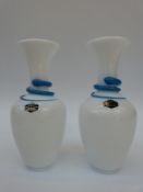 A pair of St Louis glass vases with applied blue decoration in the form of a stylised snake over