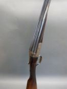 Manton & Co 12 bore side by side ejector shotgun with named and engraved locks, chequered grip,