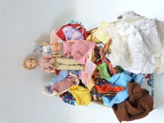 Two Sindy dolls together with a large collection of dolls clothes and accessories