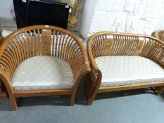 A suite of inlaid hardwood furniture, two sofas,