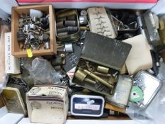 A large collection of vintage fishing tackle fittings, mainly for rods, including brass butt ends,