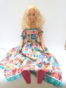 Mattel doll with painted mouth and eyes,