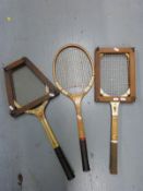 Three vintage tennis racquets