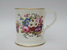 A Victorian Staffordshire porcelain oversize mug hand decorated with flowers and H.