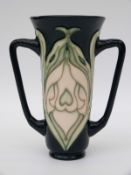 Moorcroft twin handled loving cup with WM and MCC to base (15cm tall)
