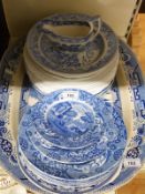A quantity of blue and white ceramics including some Spode,