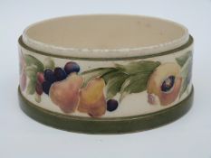 William Moorcroft circular dish in early Pomegranate pattern c.1913 (diameter 13.