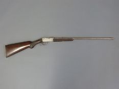 Belgian push forward underlever rook rifle with chequered semi-pistol grip and forend and 22 inch