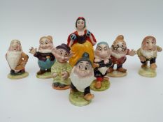 Beswick and Disney Snow White and the Seven Dwarfs, all with BP2 gold oval backstamps,