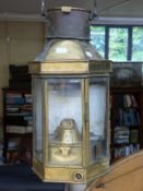 A brass-cased ship's masthead or similar lamp stamped EG & S 1918