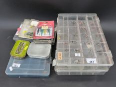 A large quantity of fishing flies in sectional containers