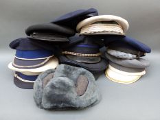 A collection of peaked police caps,