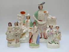 Four 19th C Staffordshire figures including Scottish interest and a modern cricketer (tallest 42cm)