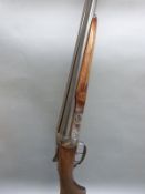 AYA 12 bore side by side wildfowling shotgun with border engraving, widened forend,