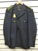 A Norwegian police tunic and a similar bomber jacket