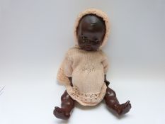 Armand Marseille black doll with open mouth, weighted brown eyes and jointed composite body,