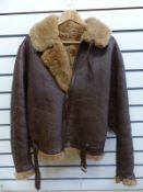 A WWII leather and sheepskin flying jacket,