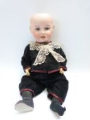 Reinecke bisque headed doll with open mouth, weighted blue eyes and jointed composition body,