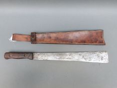 A WWII 1945 machete impressed MKII MIL45 in leather sheath and also dated 1945