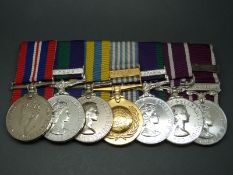 A group of seven medals awarded to 21125661 Sgt J.
