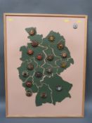 A collection of police European badges geographically placed on a display board