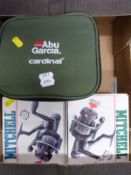 Two boxed Mitchell fishing reels and an Abu Garcia example