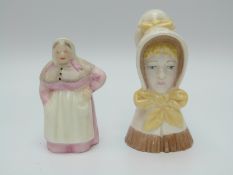 Two Royal Worcester candle snuffers,