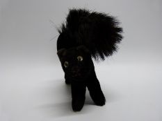 Steiff cat with shaved black mohair and glass eyes,