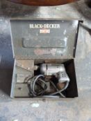 A vintage cased Black and Decker drill