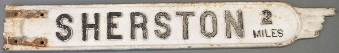 A vintage cast iron 'Sherston 2 miles' double sided finger post road sign,