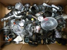 A box of loose fixed spool fishing reels