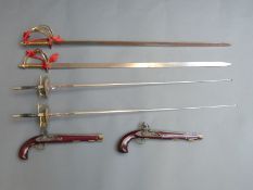 A pair of replica pistols and two pairs of swords
