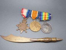 A group of three WWI medals awarded to 1606 Pte H Charlwood Oxf & Bucks L I comprising 1914-15 star,