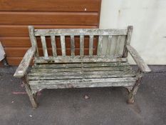 A teak garden bench (length 128cm)
