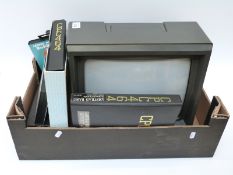 Amstrad CPC 464 computer system with CTM 640 monitor, instruction booklet and a quantity of tapes,