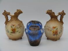 A pair of blush ivory Victorian jugs by E W Turn, Wien,