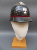 Three continental police helmets including a Dutch steel example