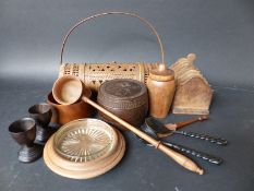 A collection of wooden items to include a c19thC toddy spoon / punch ladle, a wooden shaker,