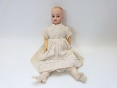 Damerval & Laffranchy bisque headed doll with open mouth,