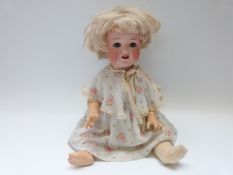 Ernst Heubach bisque headed doll with open mouth, weighted blue eyes,