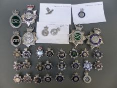 A collection of various police badges including Derbyshire, Staffordshire, Warwickshire,