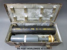 A boxed circa WWII charge drill fuse in case with original storage tube,