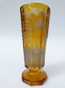 A 19th century continental flash overlaid engraved glass beaker of octagonal form decorated with