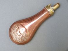 James Dixon & Sons copper and brass powder flask with embossed decoration of a shooting scene