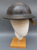 A WWII Dunn & Co Ltd home front bakelite helmet