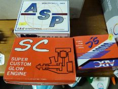 Three boxed glow engines to suit radio control model boats comprising SC91,
